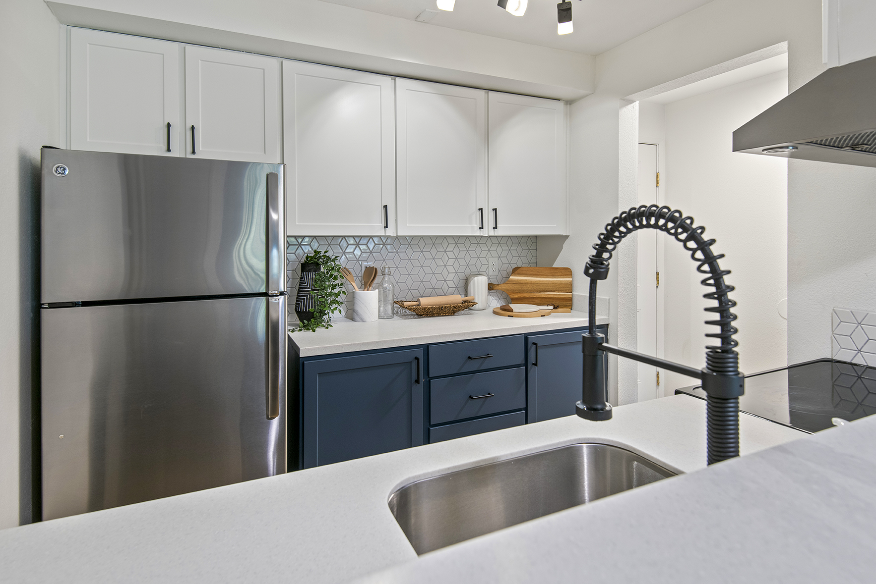 Kitchen with white cabinets at Park 120 pet-friendly apartments in Everett, WA